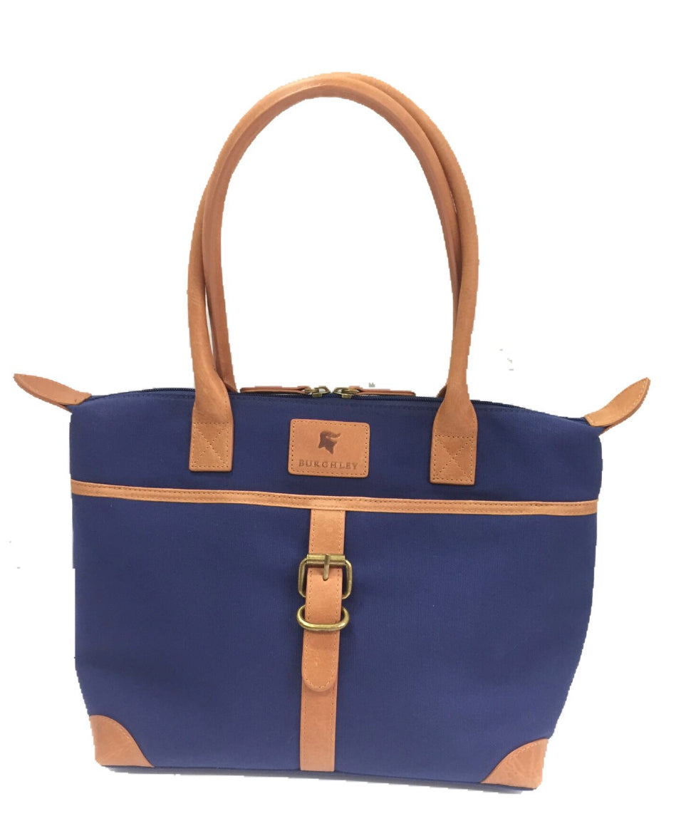 The Sedgebrook Handbag.  A classic and timeless bag by Burghley Bags.  Handmade from strong cotton canvas and leather. With strong leather handles it can be used as a shoulderbag. Shown in stylish blue.