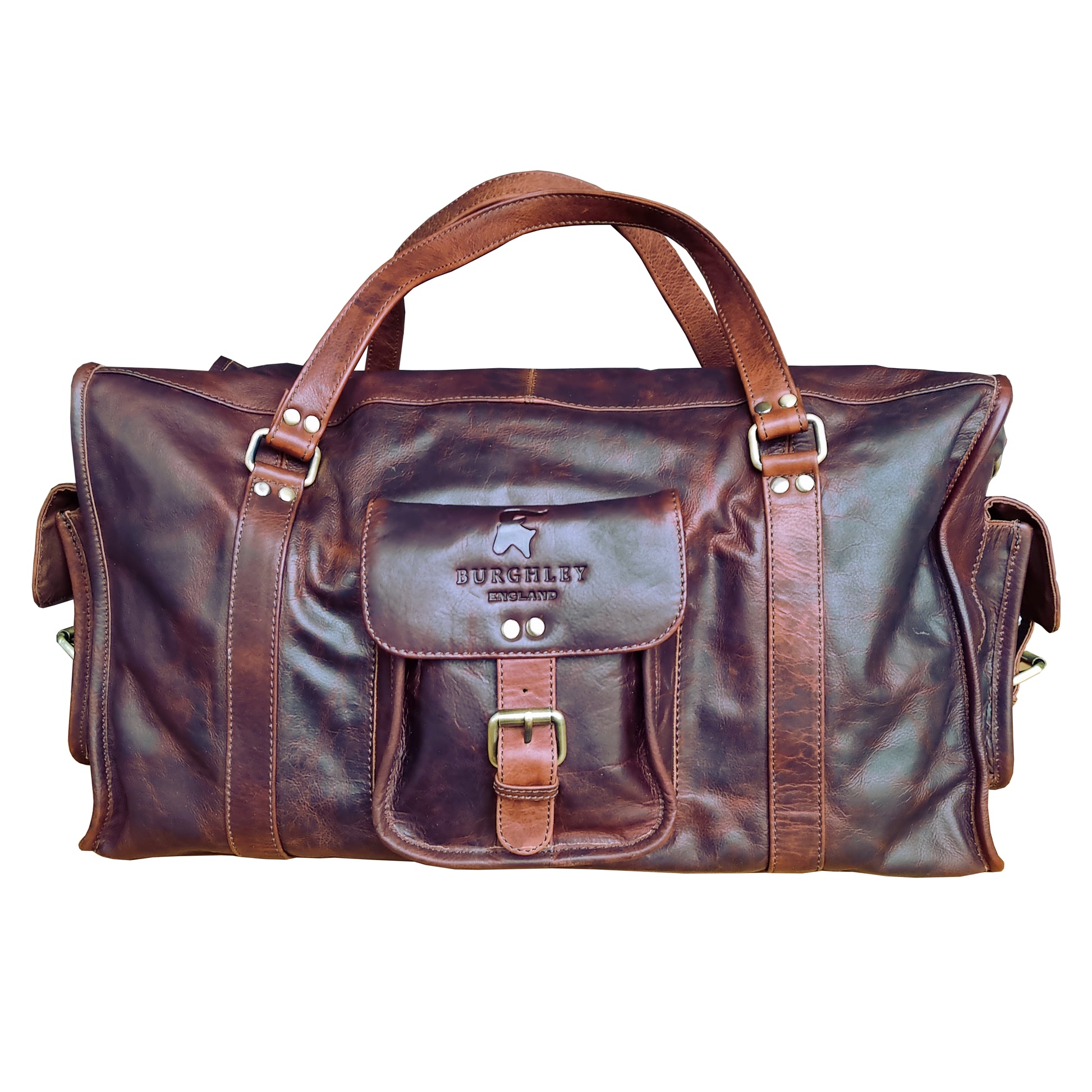 Brown full leather rugged holdall in classic English country style. Handmade from full grain vegetable tanned cow leather.