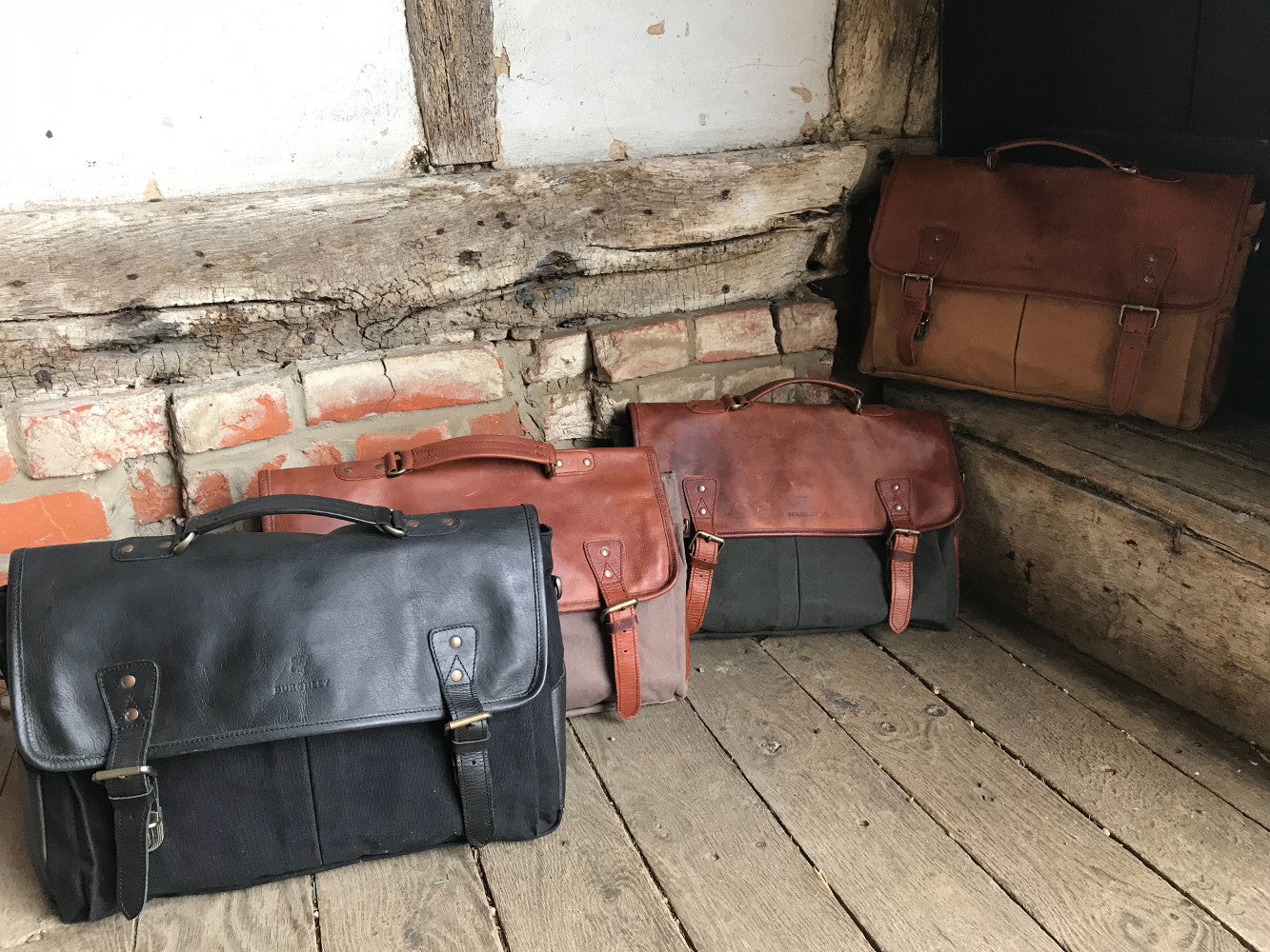 The Barholm. A contemporary handmade leather and canvas briefcase by Burghley Bags. Made from eco-friendly vegetable tanned leather and comes with an adjustable and detachable shoulder strap. Available in 4 colours.