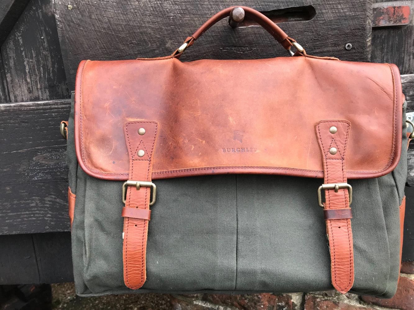 The Barholm. A contemporary handmade leather and canvas briefcase by Burghley Bags. Canvas in stylish khaki green with classic brown eco-friendly vegetable tanned leather.