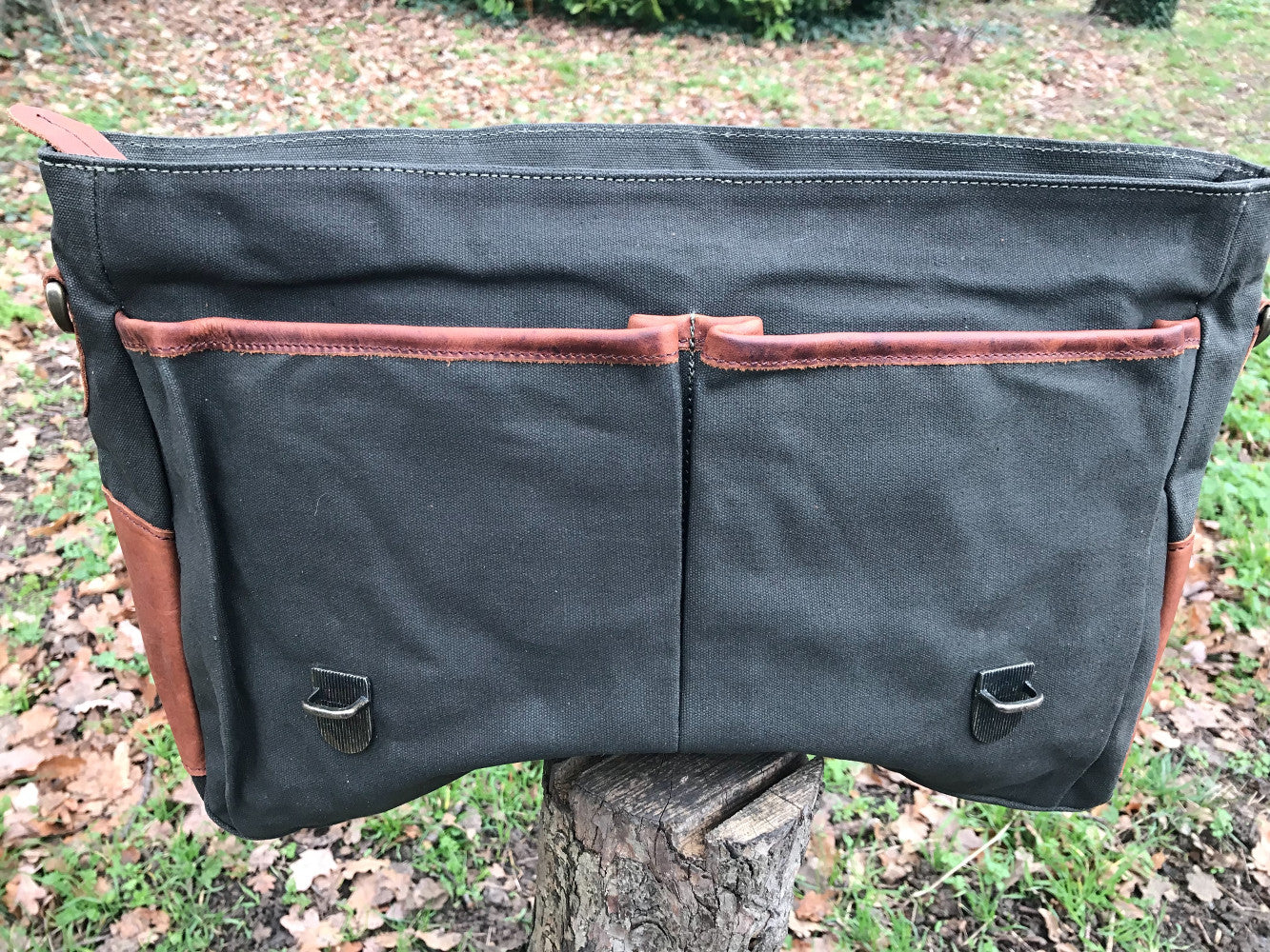 The Barholm. A contemporary handmade leather and canvas briefcase by Burghley Bags. Canvas in stylish khaki green with classic brown eco-friendly vegetable tanned leather.