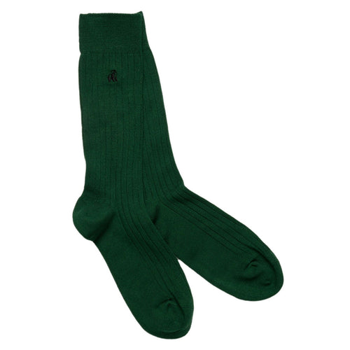 Green sock with a logo on a white background