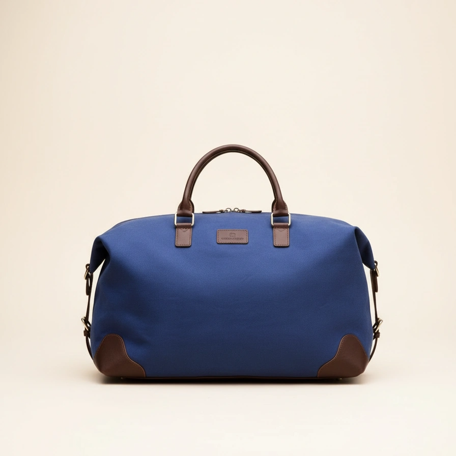 Blue duffel bag with brown accents on a beige background