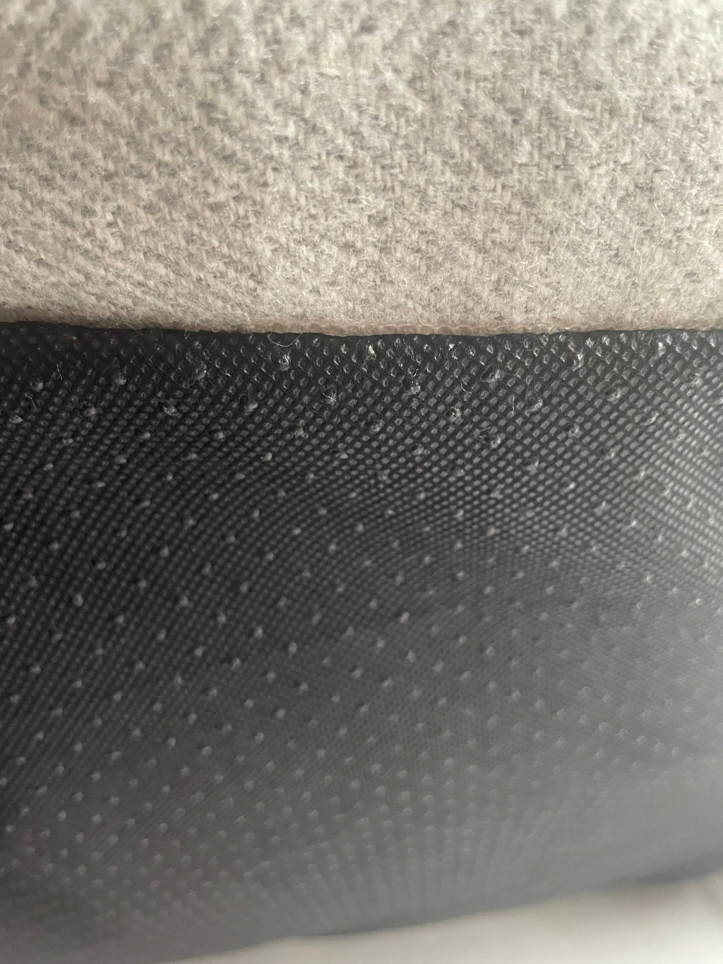 Close-up of a textured surface with a patterned top and solid bottom