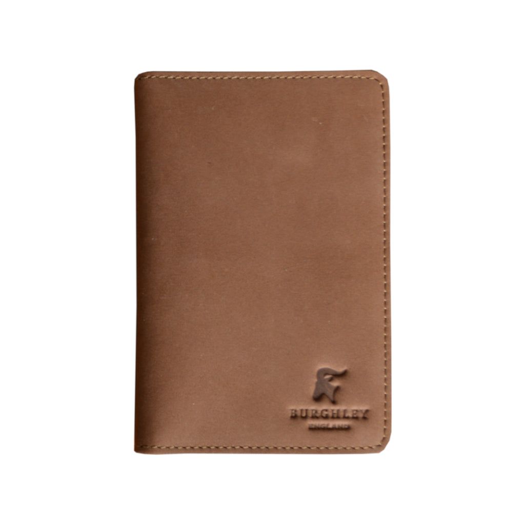 Real leather handmade passport holder in caramel suede.