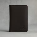 Dark brown leather wallet with 'Furnily' branding on a gray background