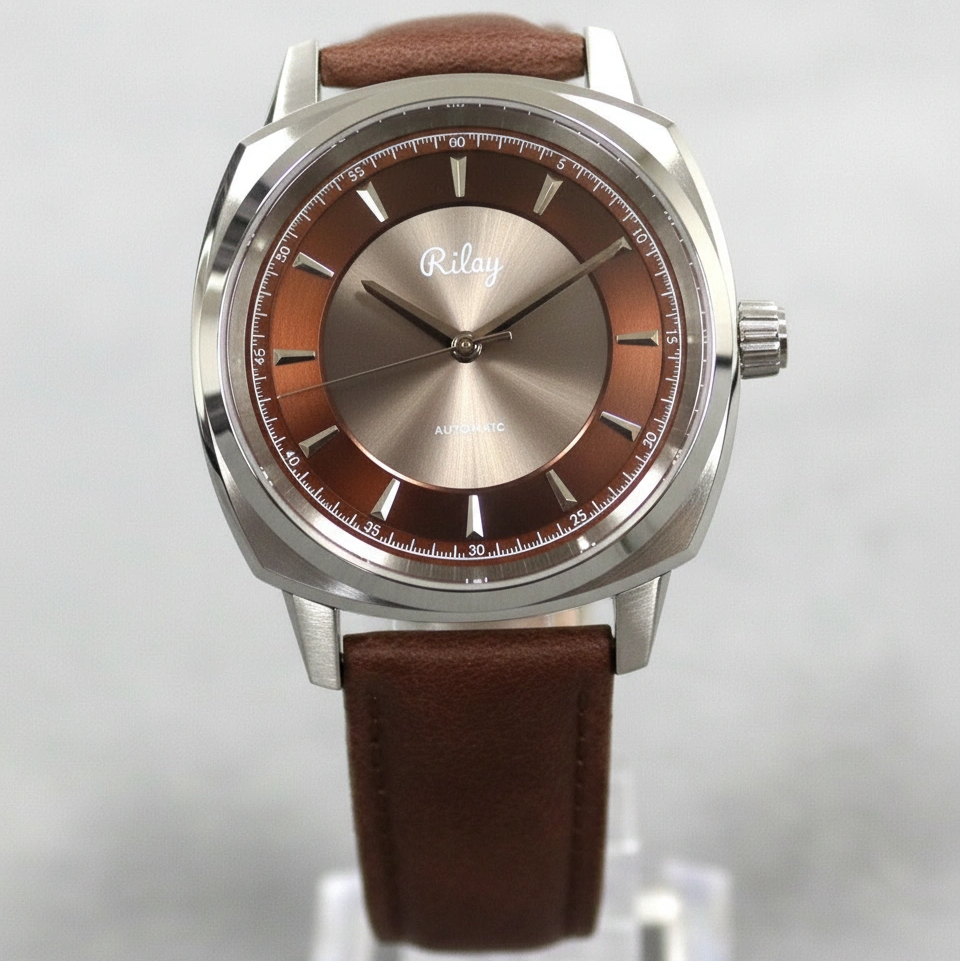 Watch with brown strap and silver case on a light gray background