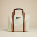 Beige tote bag with brown and red straps and 'BDXY Studio' logo on a beige background