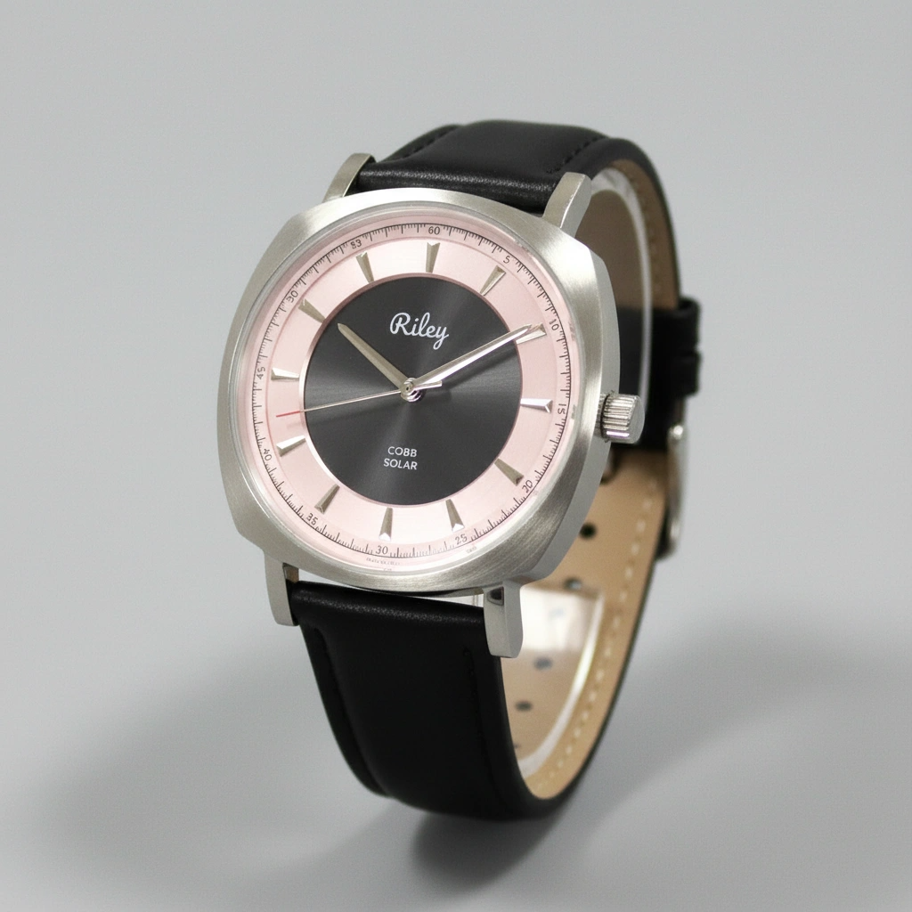 Wristwatch with black leather strap and silver case on a gray background