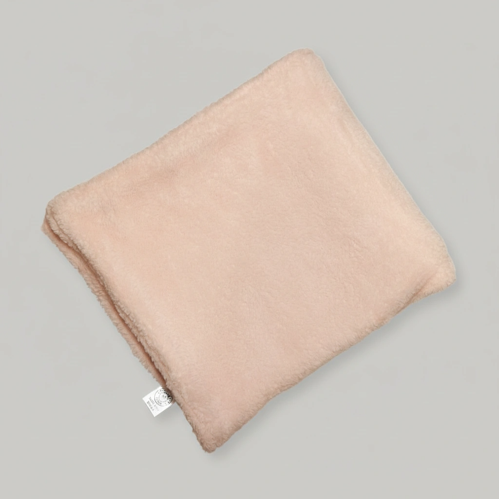 Beige pillow on a gray background