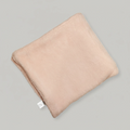 Beige pillow on a gray background