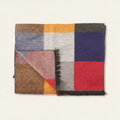 Multicolored checkered scarf on a light beige background