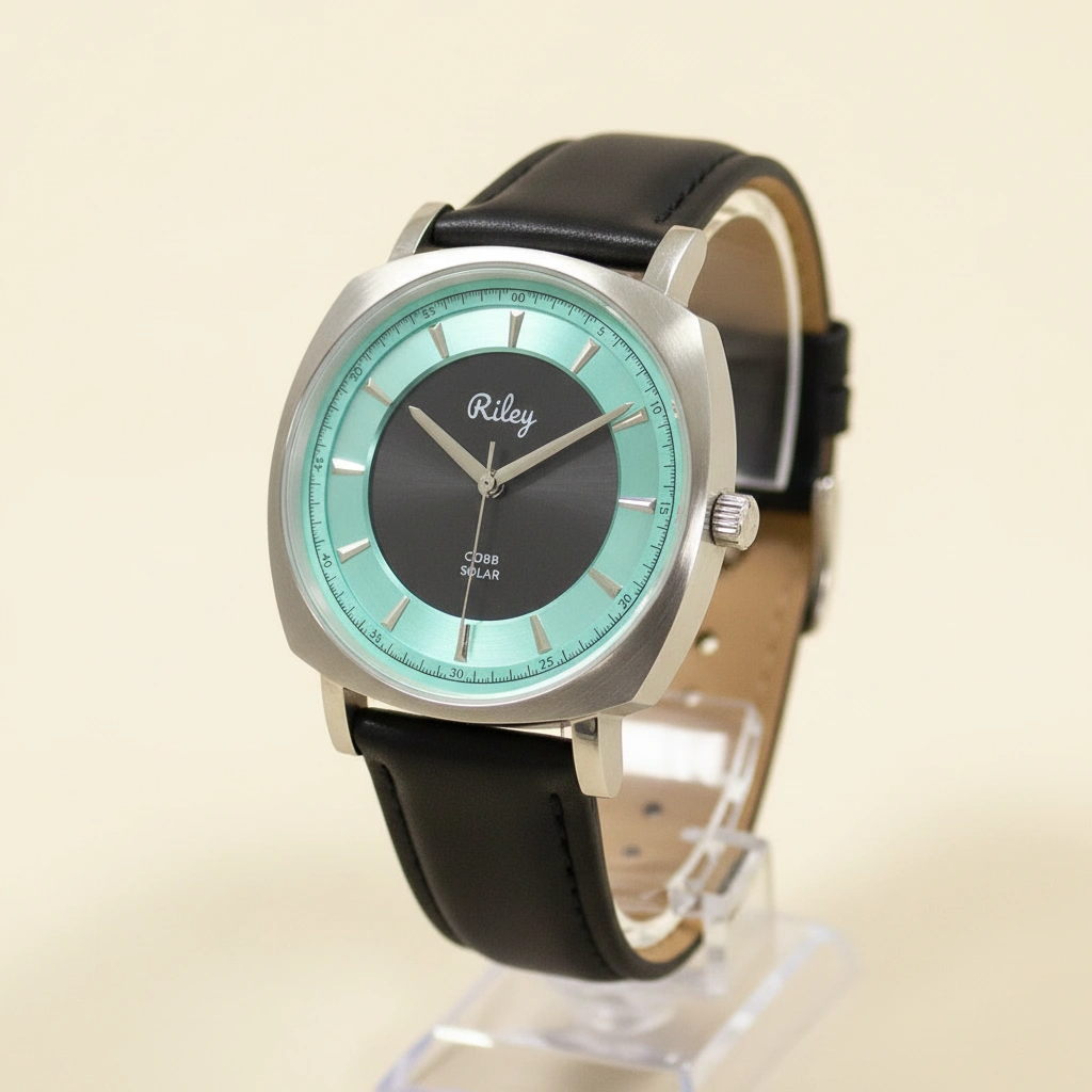 Wristwatch with black strap and turquoise face on a beige background