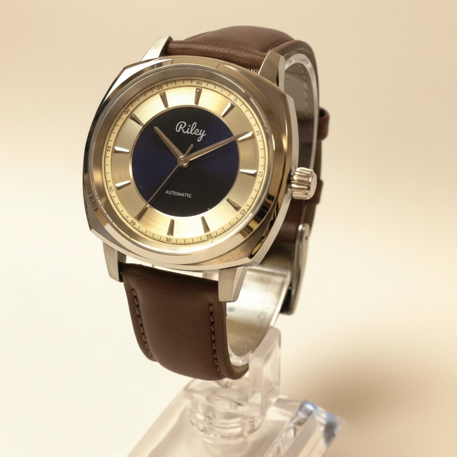 Watch with gold face and brown leather strap on a beige background
