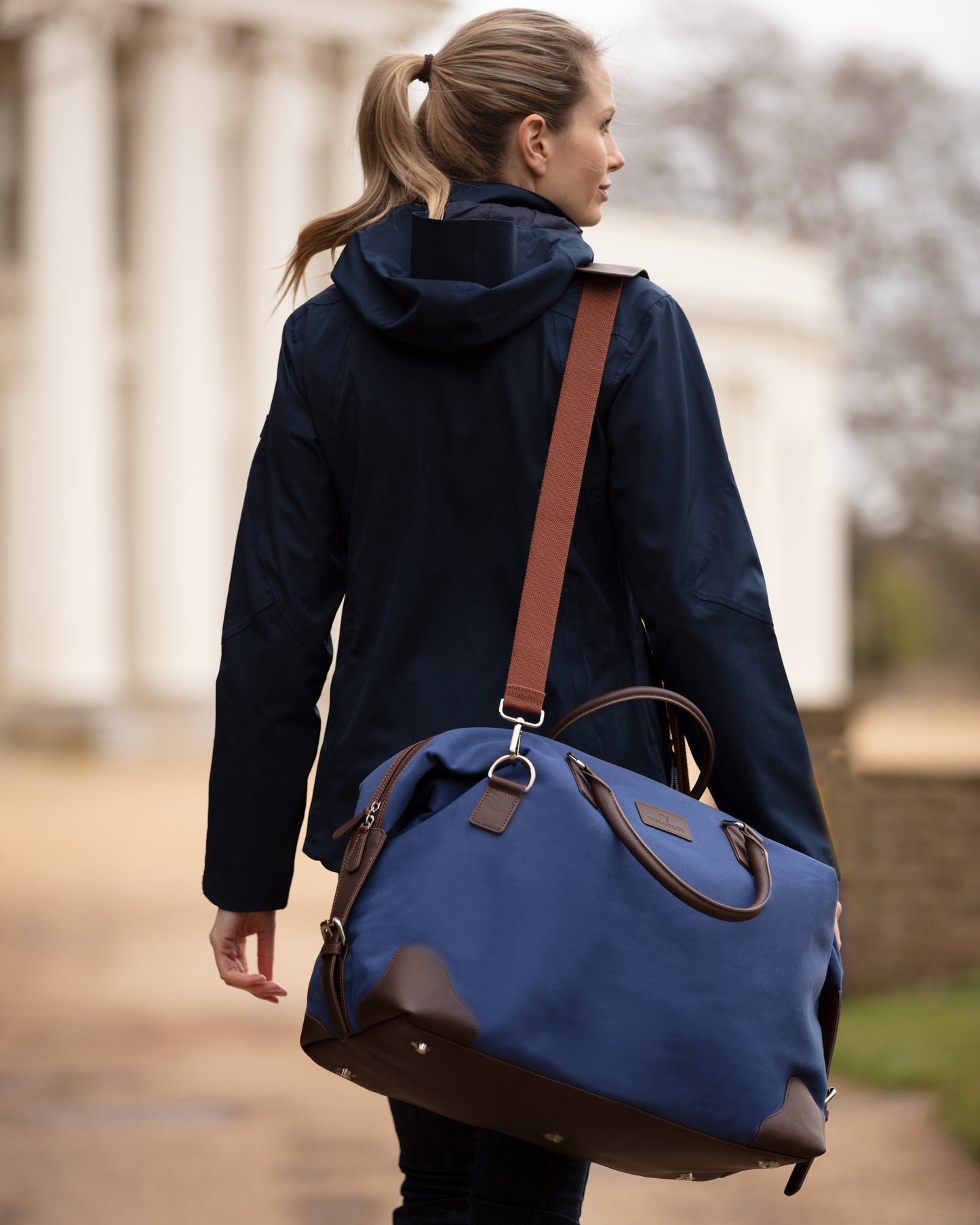 Handmade blue cotton canvas and vegetable tanned leather holdall by Burghley Bags.