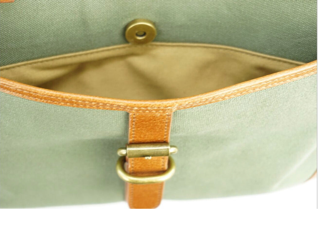 The Sedgebrook Handbag.  A classic and timeless bag by Burghley Bags.  Handmade from strong cotton canvas and leather. With strong leather handles it can be used as a shoulderbag. Front pocket shown.