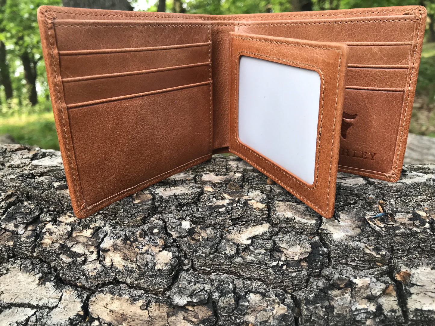 The Classic Wallet. An elegant handmade leather wallet by Burghley Bags in a classic tan colour. It features 6 card slots, 4 slip pockets and 2 compartments for notes/bills.