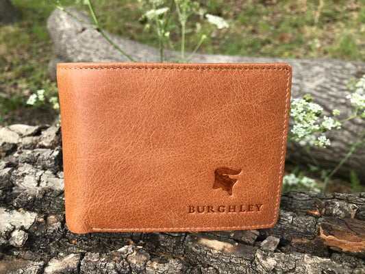 The Classic Wallet. An elegant handmade leather wallet by Burghley Bags in a classic tan colour. It features 6 card slots, 4 slip pockets and 2 compartments for notes/bills.