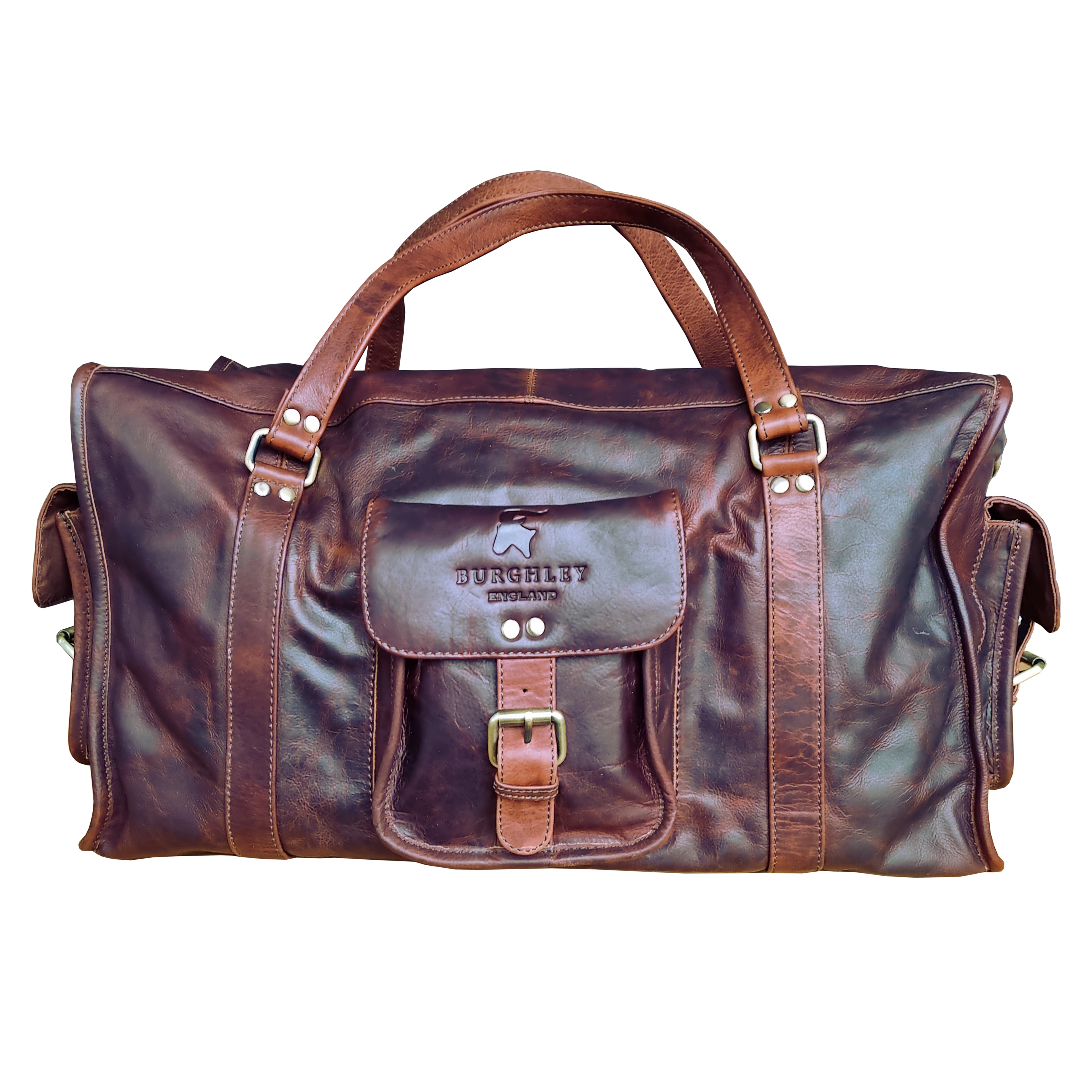 Brown full leather rugged holdall in classic English country style. Handmade from full grain vegetable tanned cow leather.