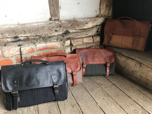 The Barholm. A contemporary handmade leather and canvas briefcase by Burghley Bags.  Made from eco-friendly vegetable tanned leather and comes with an adjustable and detachable shoulder strap. Available in 4 colours.