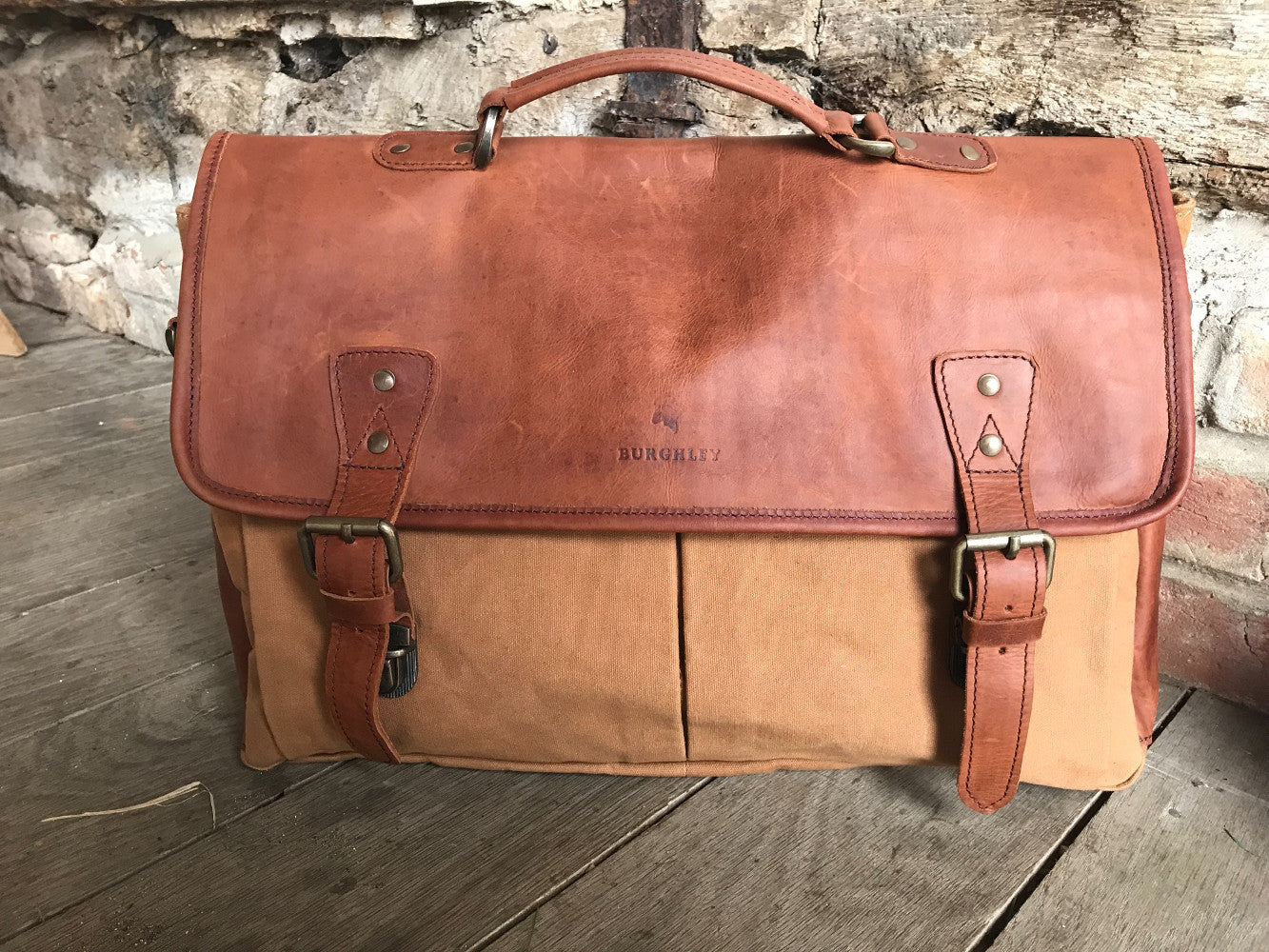 The Barholm. A contemporary handmade leather and canvas briefcase by Burghley Bags. Canvas in classic tan complimented with classic brown eco-friendly vegetable tanned leather.