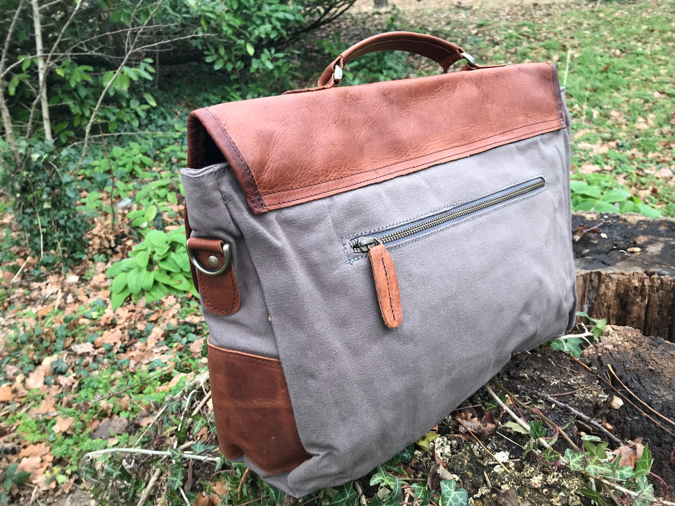 The Barholm. A contemporary handmade leather and canvas briefcase by Burghley Bags. Canvas in soft grey with classic brown eco-friendly vegetable tanned leather.