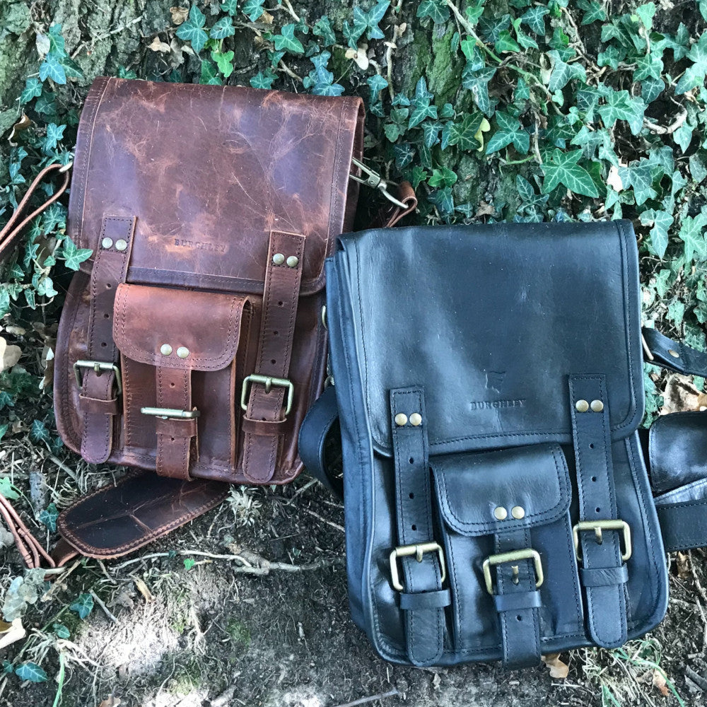 The Barrowby - A retro style hunter's leather satchel by Burghley Bags.  Handmade from soft, vegetable tanned leather. Shown in black and brown.