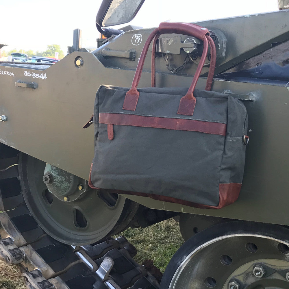 The Breton Briefcase. A casual work bag by Burghley Bags. Handmade from strong cotton canvas and supple leather.  Shown in stylish khaki green.
