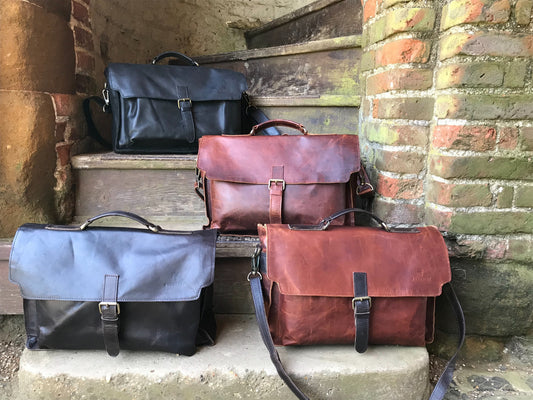 The Dorrington Briefcase.  A classic 30's styled  leather briefcase by Burghley Bags. A handmade leather vintage work bag, with enough space for 15" laptops. Comes with an adjustable and detachable shoulder strap. Available in 4 colours.
